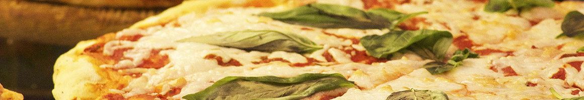 Eating Chicken Wing Fast Food Pizza at Grizzly Pizza and Wings.